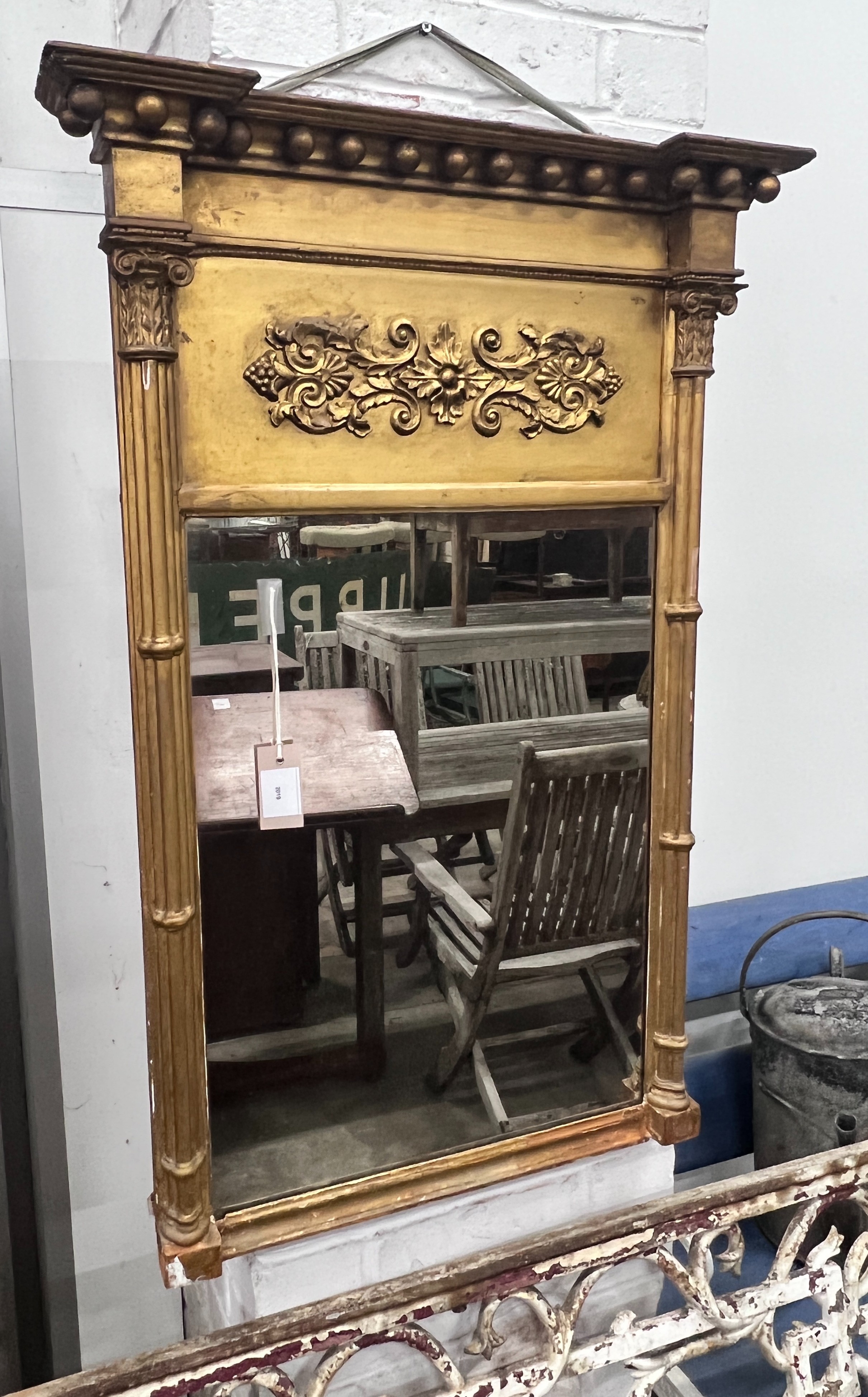 A Regency gilt wood and gesso pier glass, width 62cm, height 92cm